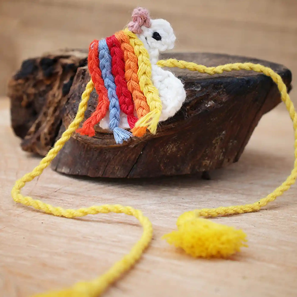 Handmade Crochet Unicorn Theme Kids Rakhi And Toy Combo With Roli Chawal Set Of 2 - Close-up of Rainbow Toy Detail