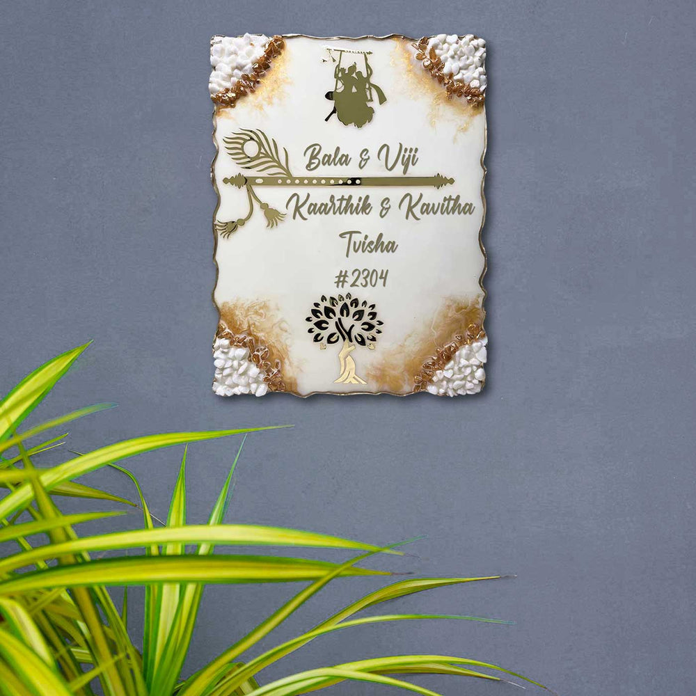 Personalized Off White Radha Krishna Theme Resin Name Plate - Mounted on Gray Wall Background