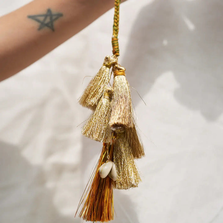 Handmade Embroidered Golden Tassels Kaju Katli Bhaiya Bhabhi Rakhi With Roli Chawal Set Of 2 - Close-up of tassel details