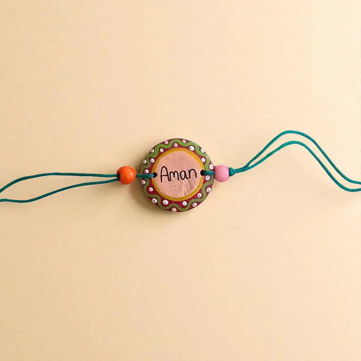 Personalized Hand-Painted Round Minimalist Terracotta Rakhi