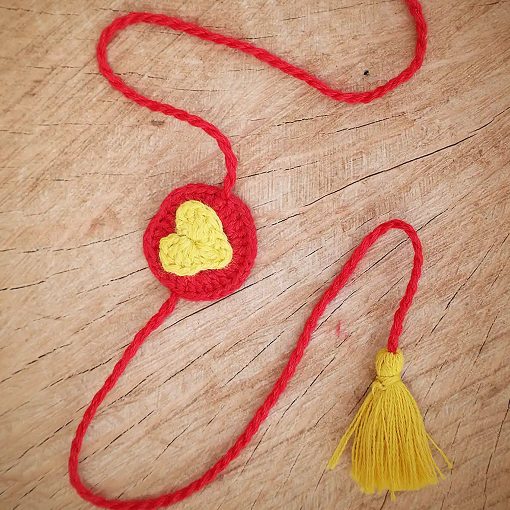 Handmade Crochet Heart Theme Kids Rakhi And Toy Combo With Roli Chawal Set Of 2 - Close-up of Heart Tassel Detail