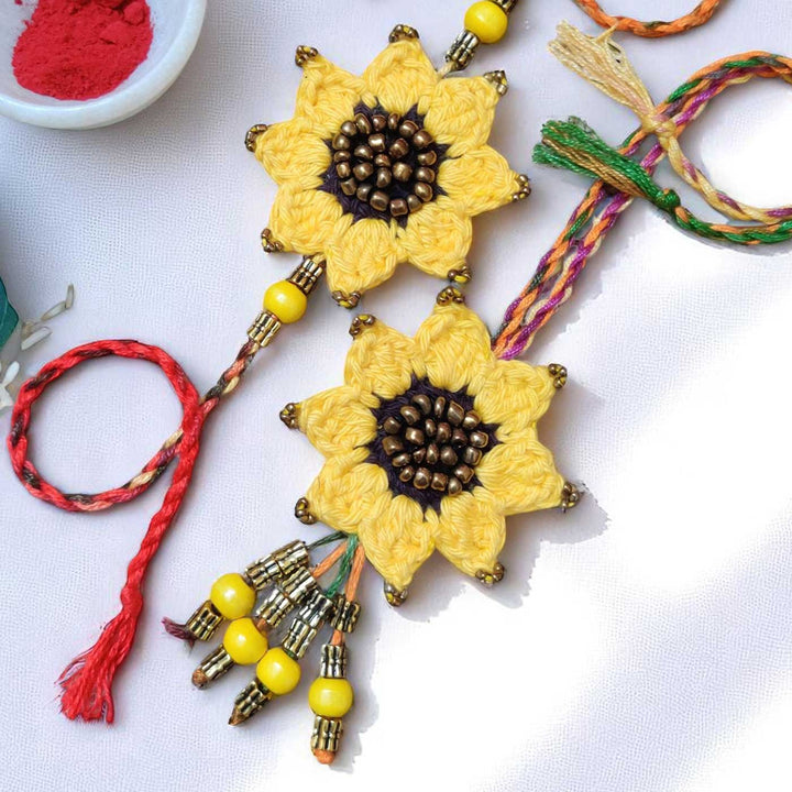 Handmade Crochet Sunflower Theme Cotton Rakhi With Roli Chawal For Bhaiya And Bhabhi - Close-up of Floral Necklace Detail