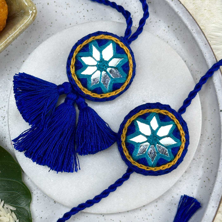 Customized Handmade Mirror Work Cotton Bhaiya Bhabhi Rakhi With Roli Chawal - Front View with Decorative Setup (5)