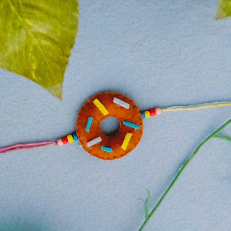 Handmade Doughnut Theme Felt Kids Rakhi - Close-up of Donut Bracelet Centerpiece