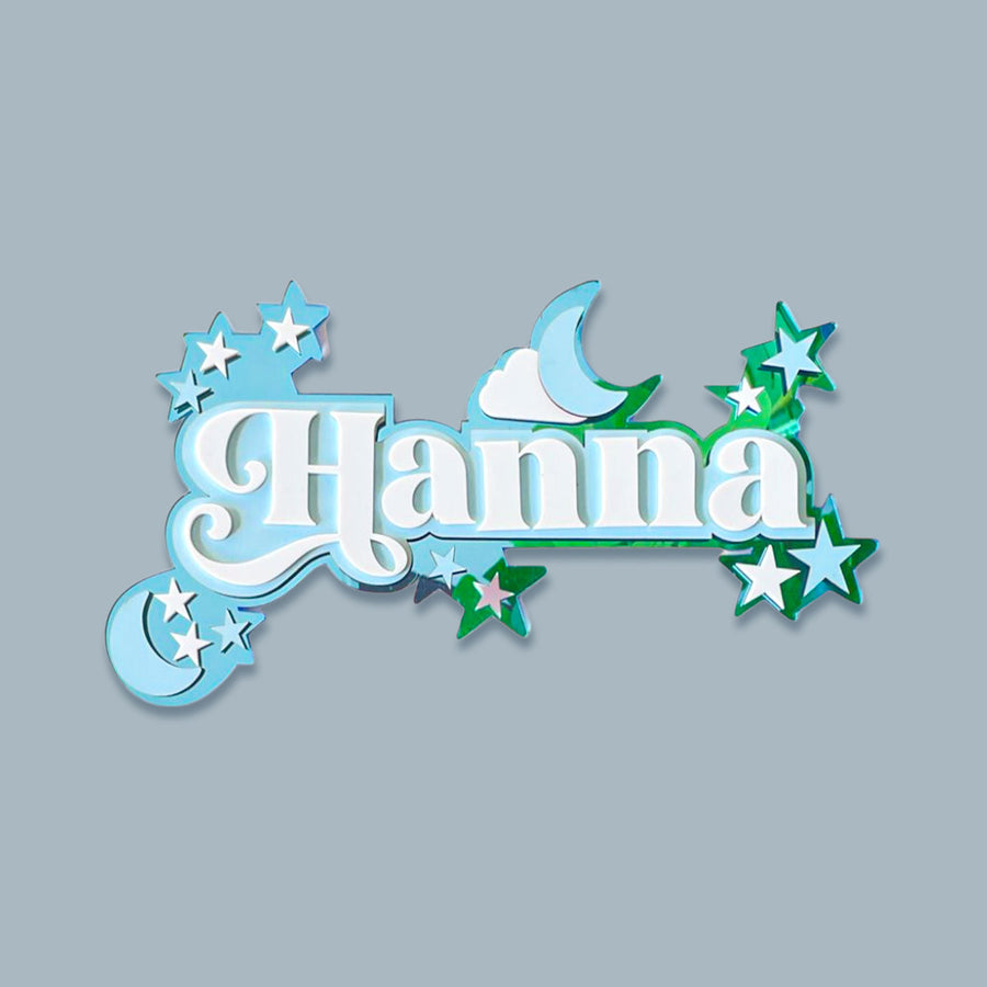 Personalized Moon Magic Theme Acrylic Kids Name Plate - Front View on Flat Surface