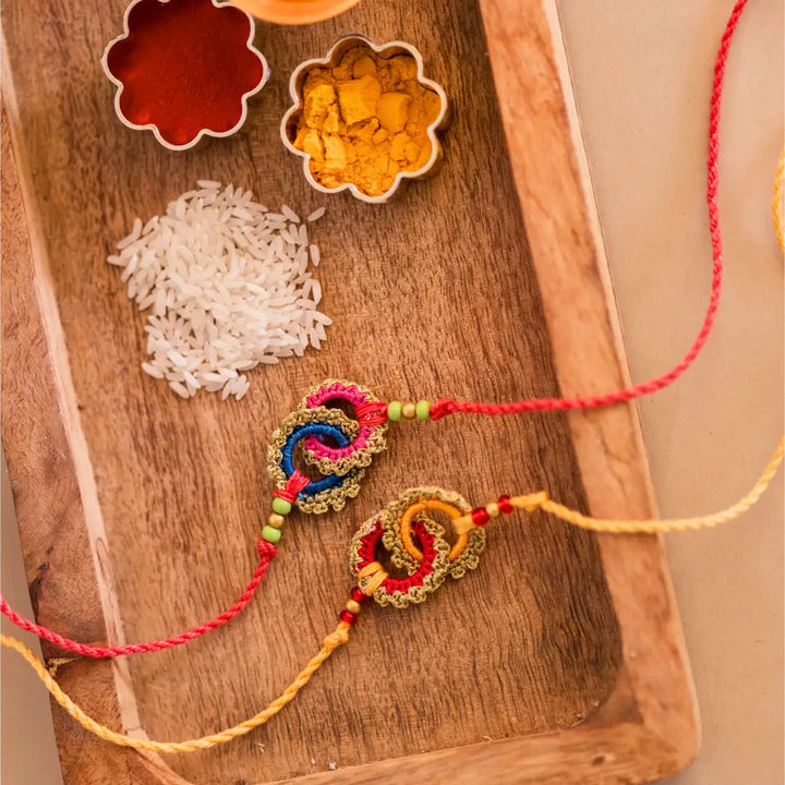 Handmade Crochet Bandhan Rakhi With Roli Chawal Set Of 2 - Decorative Threads with Ritual Items
