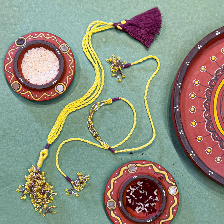 Handmade Reusable Yellow Corel And Jhumki Rakhi For Bhaiya And Bhabhi - Full Product Display with Decor