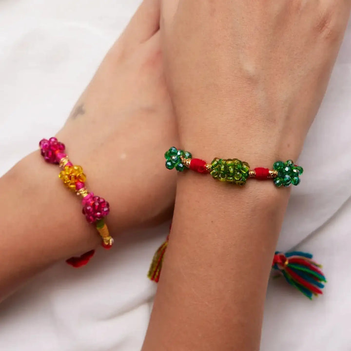 Handmade Beaded Green And Pink Zuzu Rakhi With Roli Chawal Set Of 2 - Wrist Wearing Two Bracelets