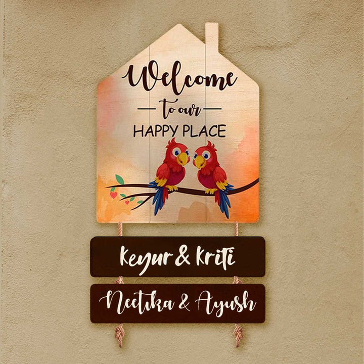 Printed Wooden House Shaped Parrot Nameplate For Family With One Child - Mounted on Wall Close-up