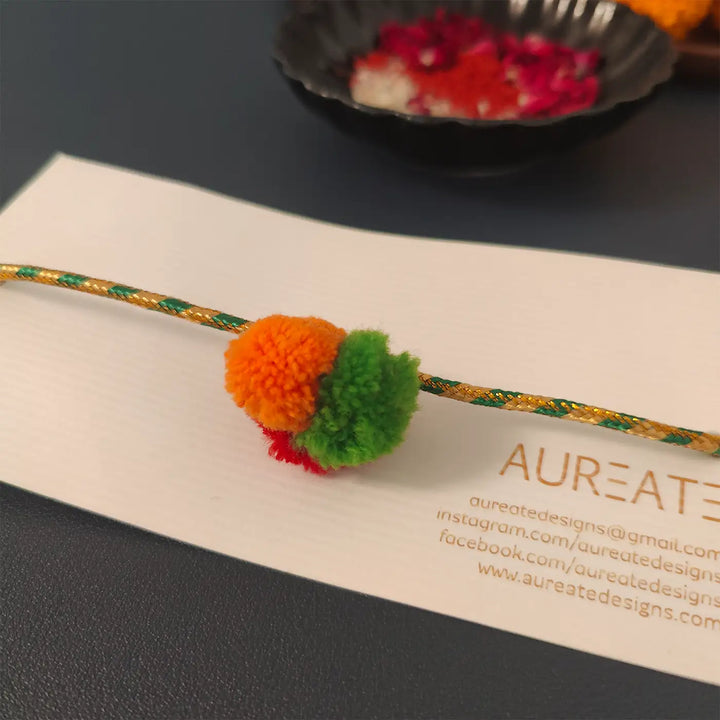 Handmade Multicolour Pom Pom Rakhi With Roli Chawal