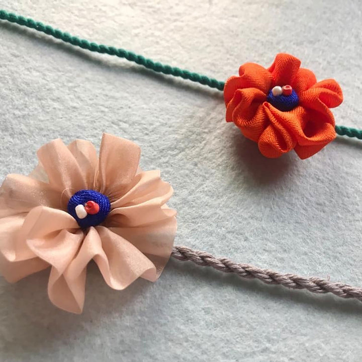 Handmade Flower Design Pom Pom Upcycled Fabric Rakhi With Roli Chawal For Brother - Detail Texture Close-up