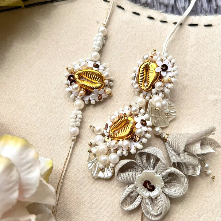 Hand Embroidered Beaded Golden Shell Bhaiya Bhabhi Rakhi With Roli Chawal Set Of 2 - Close-up Detail View