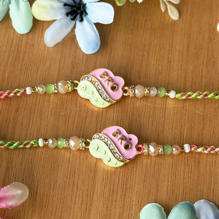 Handmade Pink And Green Beaded Bro Rakhi With Roli Chawal - Close-up Front View