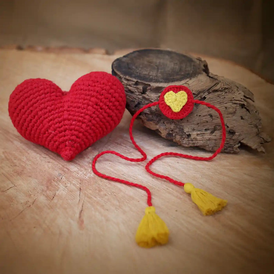 Handmade Crochet Heart Theme Kids Rakhi And Toy Combo With Roli Chawal Set Of 2 - Decorative Heart with Tassel