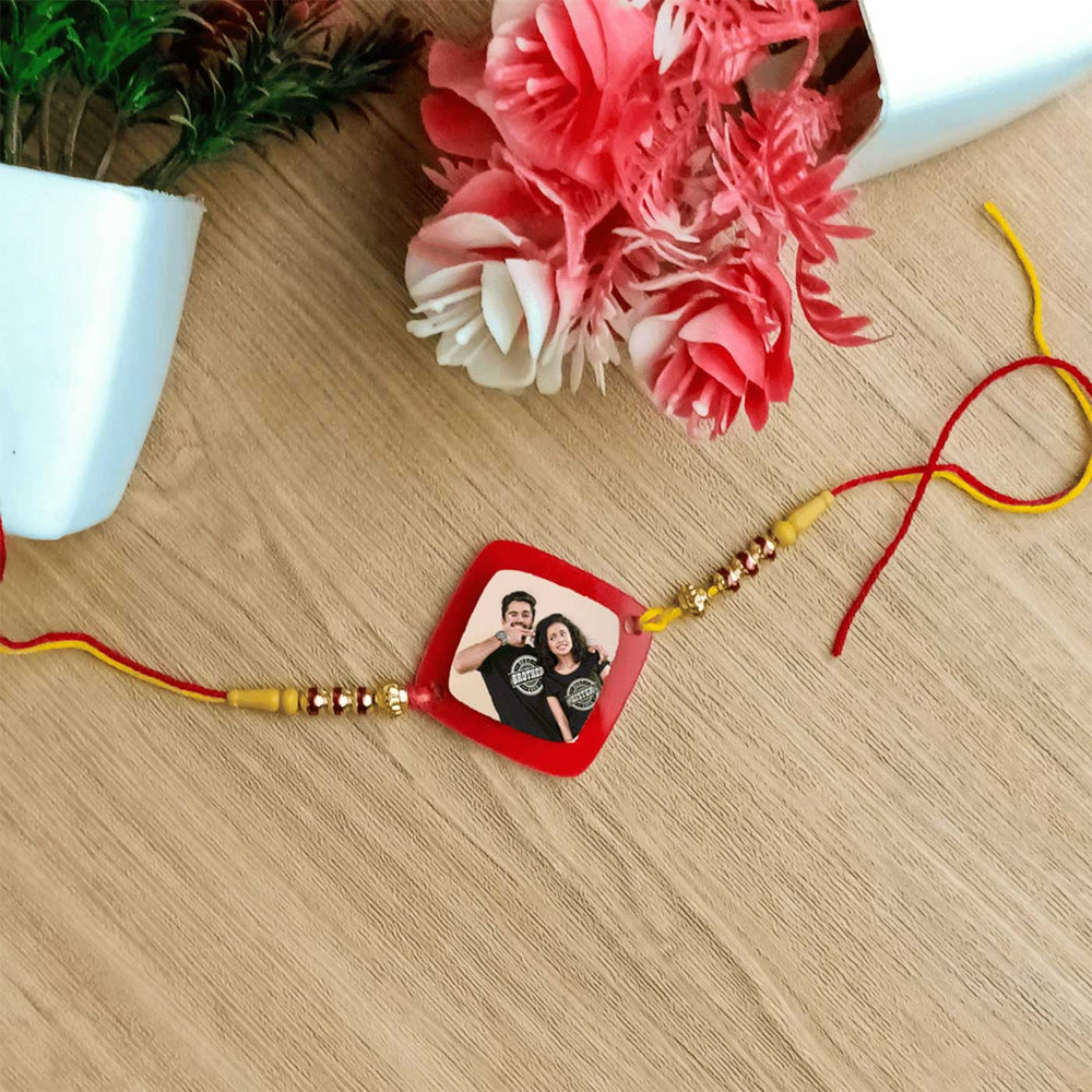 Photo Personalized Handmade Minimal Design Rudraksh Rakhi - Flat lay of Rakhi with decor