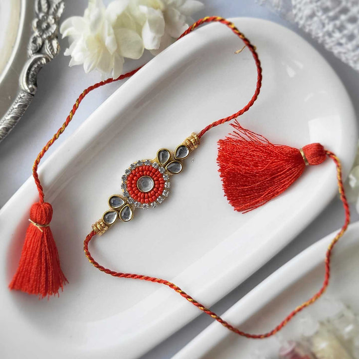 Handmade Beaded Pearl Hathfool Rakhi Hamper With Roli Chawal For Bhaiya And Bhabhi - Close-up of smaller rakhi piece