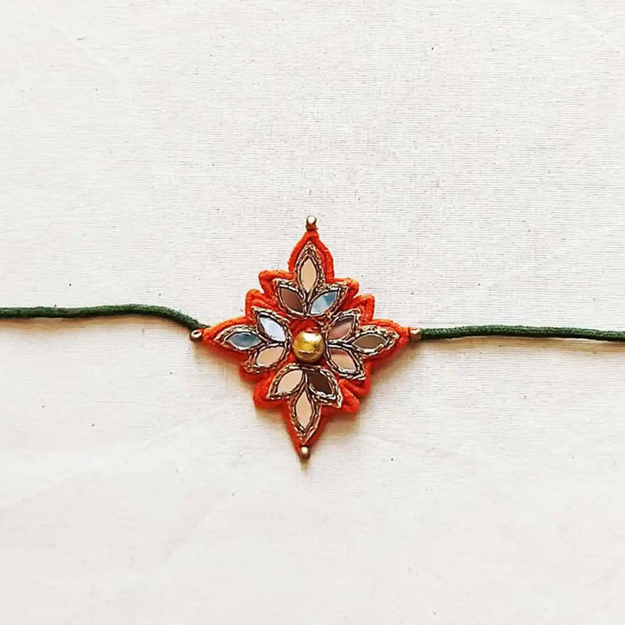 Handmade Dori Work Festive Flower Rakhi With Roli Chawal - Front View
