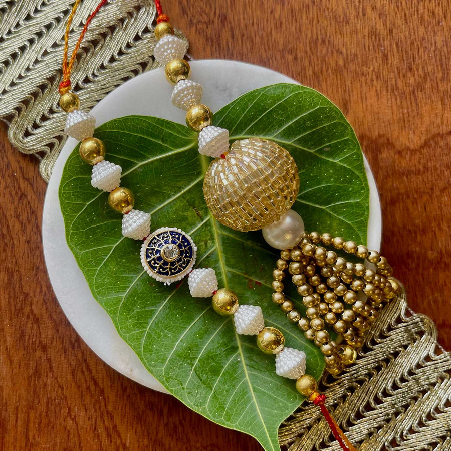 Handmade Blue And Gold Design Pearl And Stone Bhaiya Bhabhi Rakhi - Full Product Display