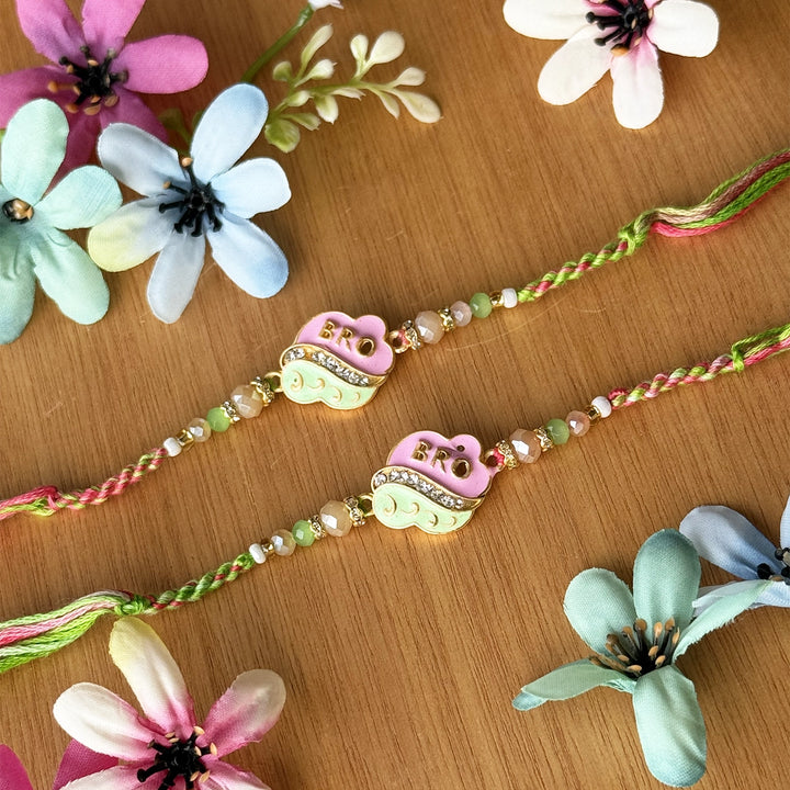 Handmade Pink And Green Beaded Bro Rakhi With Roli Chawal - Angled Close-up View