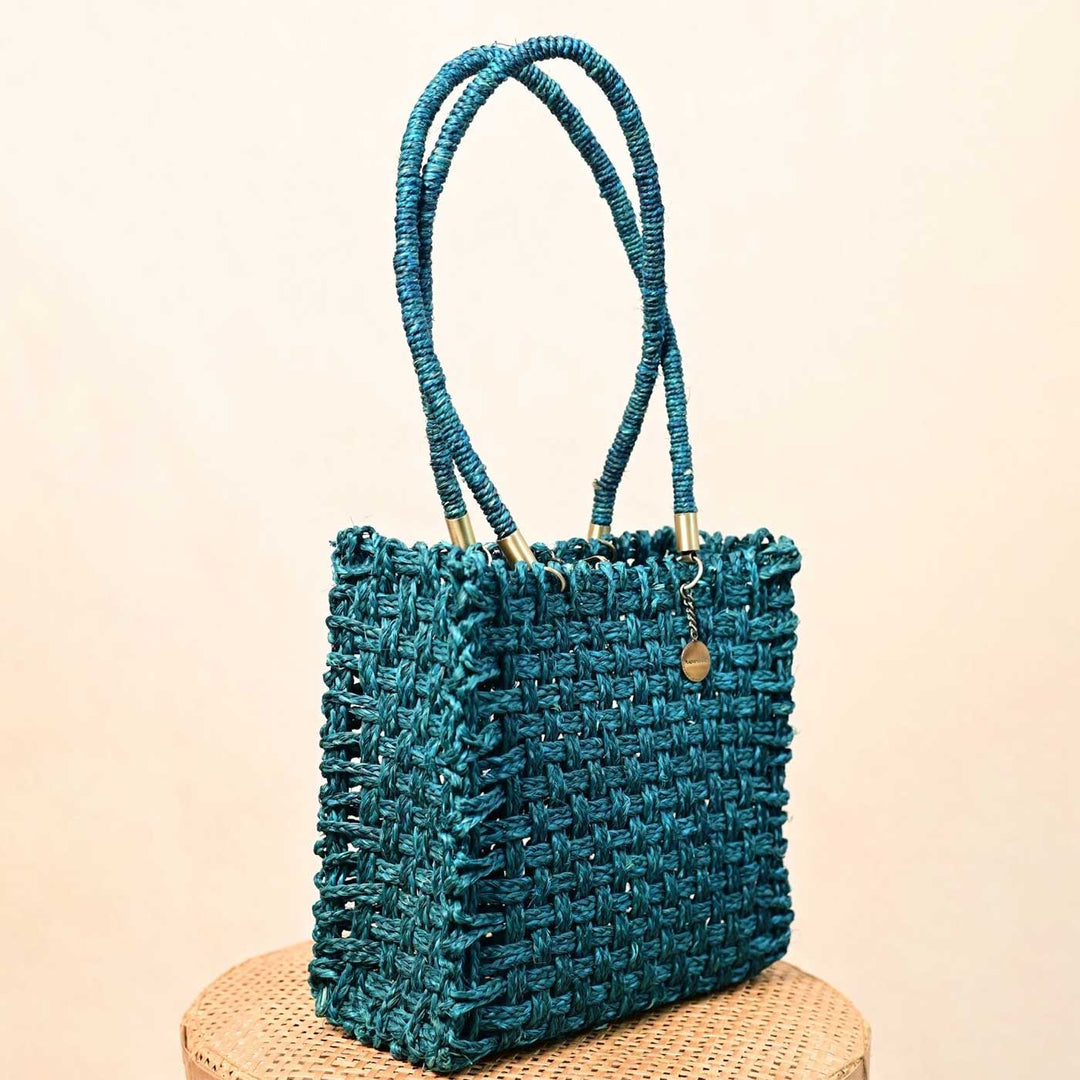 Handmade Grass Woven Vegan Wrapped Rope Handles With Metal Accents Indigo Sabai Mesh Handbag