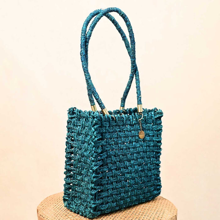 Handmade Grass Woven Vegan Wrapped Rope Handles With Metal Accents Indigo Sabai Mesh Handbag