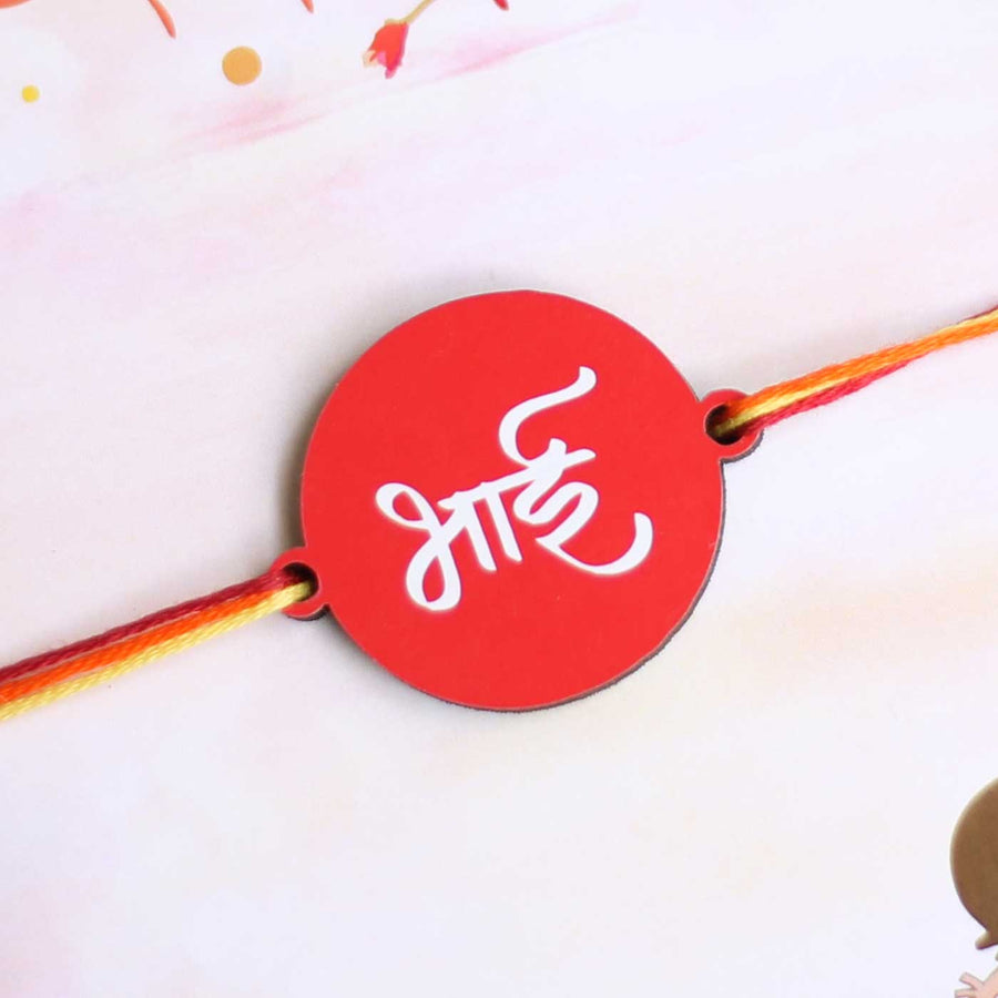 Handmade Bhai Magnet Wooden Rakhi With Roli Chawal For Brother - Close-up of Rakhi Charm