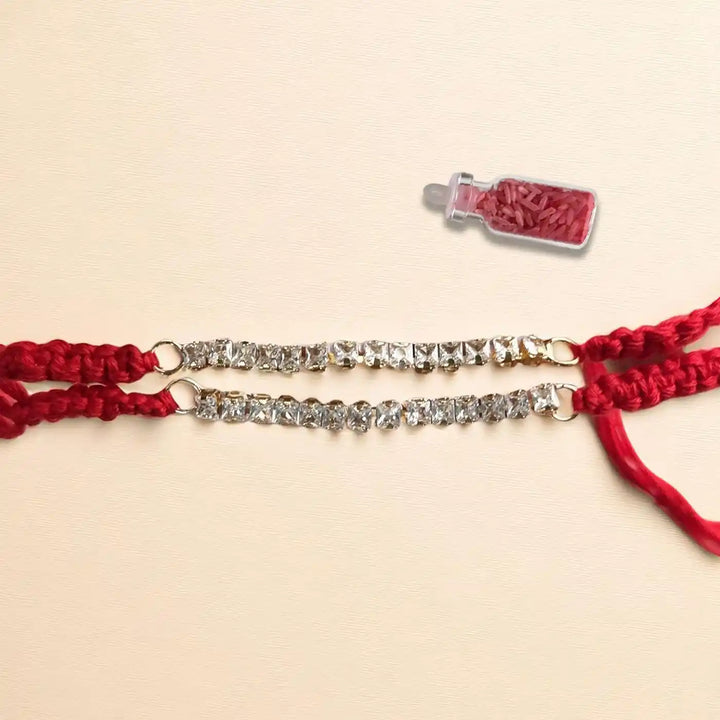 Handmade White Stone Bracelet Rakhi With Roli Chawal - Flat Lay with Decorative Item