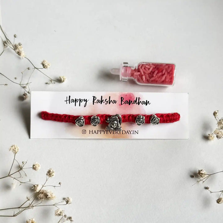Handmade Shiv Motif Rakhi With Roli Chawal - Bracelet on Packaging Card