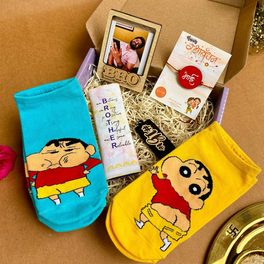 Photo Personalized Shinchan Theme Rakhi Hamper For Brother Includes 1 Rakhi 2 Pair Socks 1 Keychain 1 Fridge Magnet And 1 Chocolate - Gift Box Set with Socks