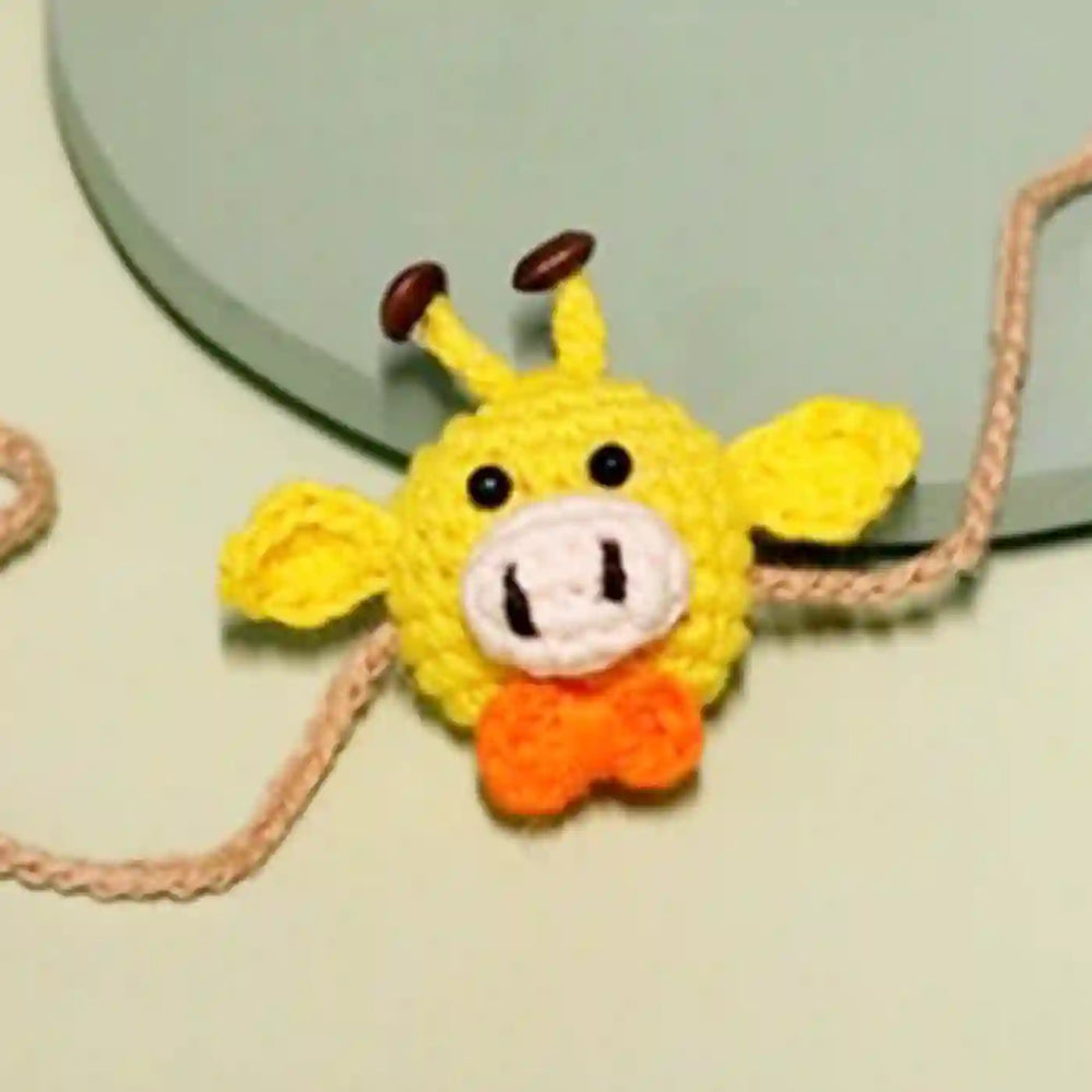Handmade Crochet Giggling Giraffe Kids Rakhi With Roli Chawal - Close-up of Crochet Detail