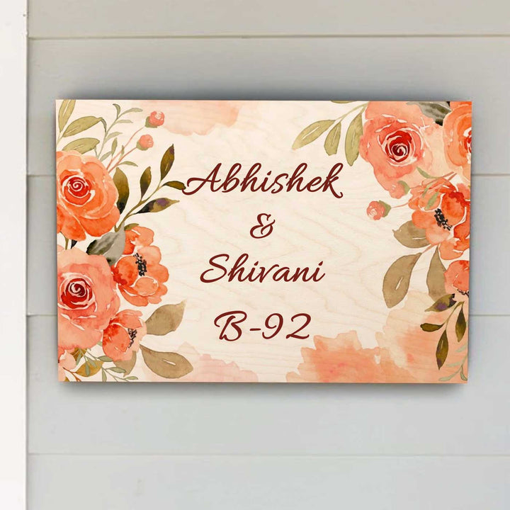Printed Orange Floral Wooden Rectangle Nameplate 1 - Mounted on Wall Showing Personalization