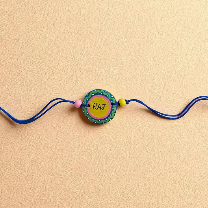 Personalized Hand-Painted Round Minimalist Terracotta Rakhi