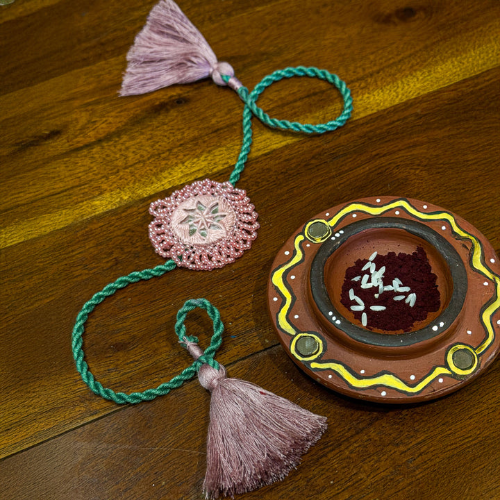 Handmade Reusable Pink And Green Mirror Jhumki Rakhi For Brother - Display with Ritual Plate and Powder