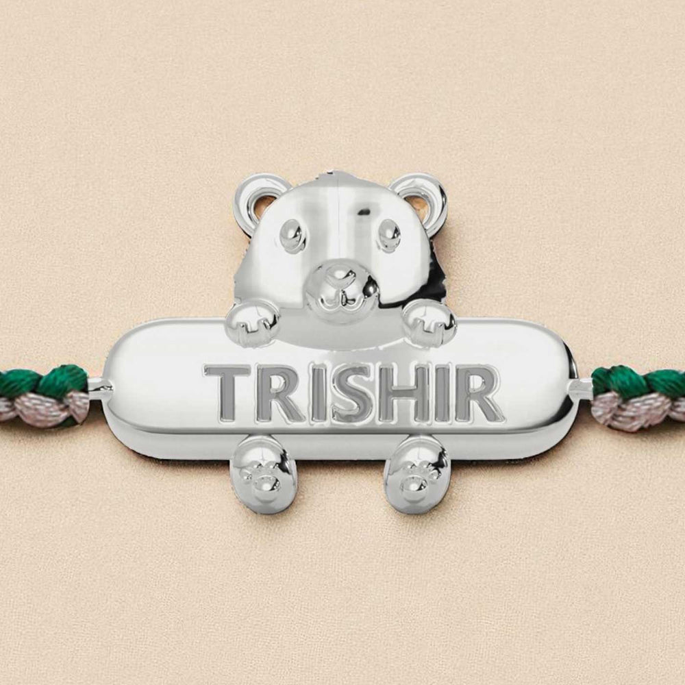 Personalized Handmade Bear Design Silver Kids Rakhi - Close-up of Engraved Nameplate