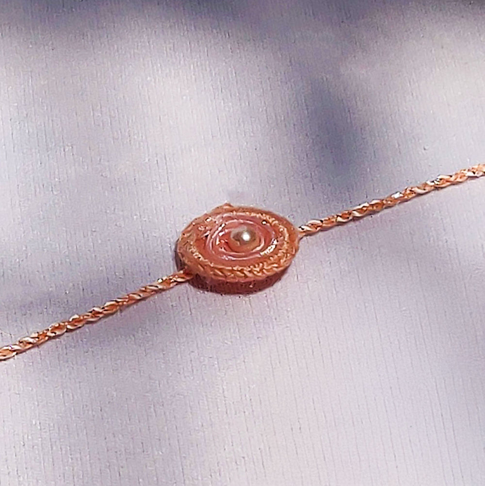 Handmade Pastel Floral Bliss Pearl Bhaiya Bhabhi Rakhi With Roli Chawal - Close-up of bracelet centerpiece