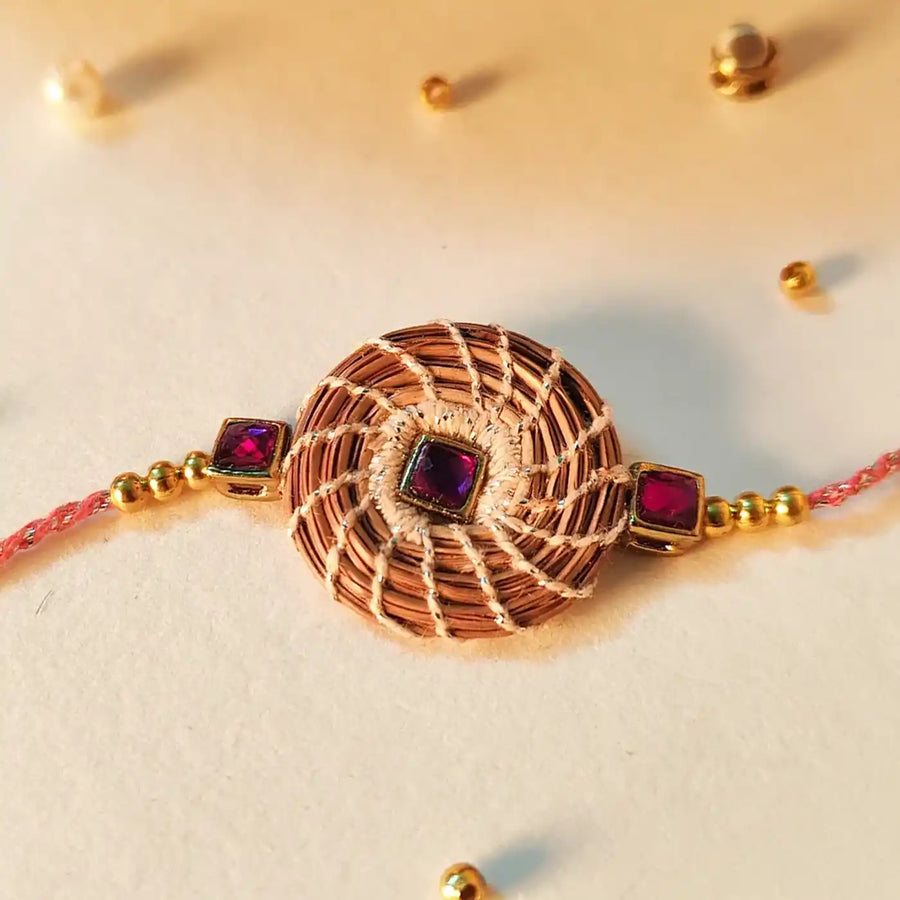 Eco Friendly Handmade Purple Stone Pine Needle Rakhi With Pouch And Roli Chawal - Close-up of Rakhi details