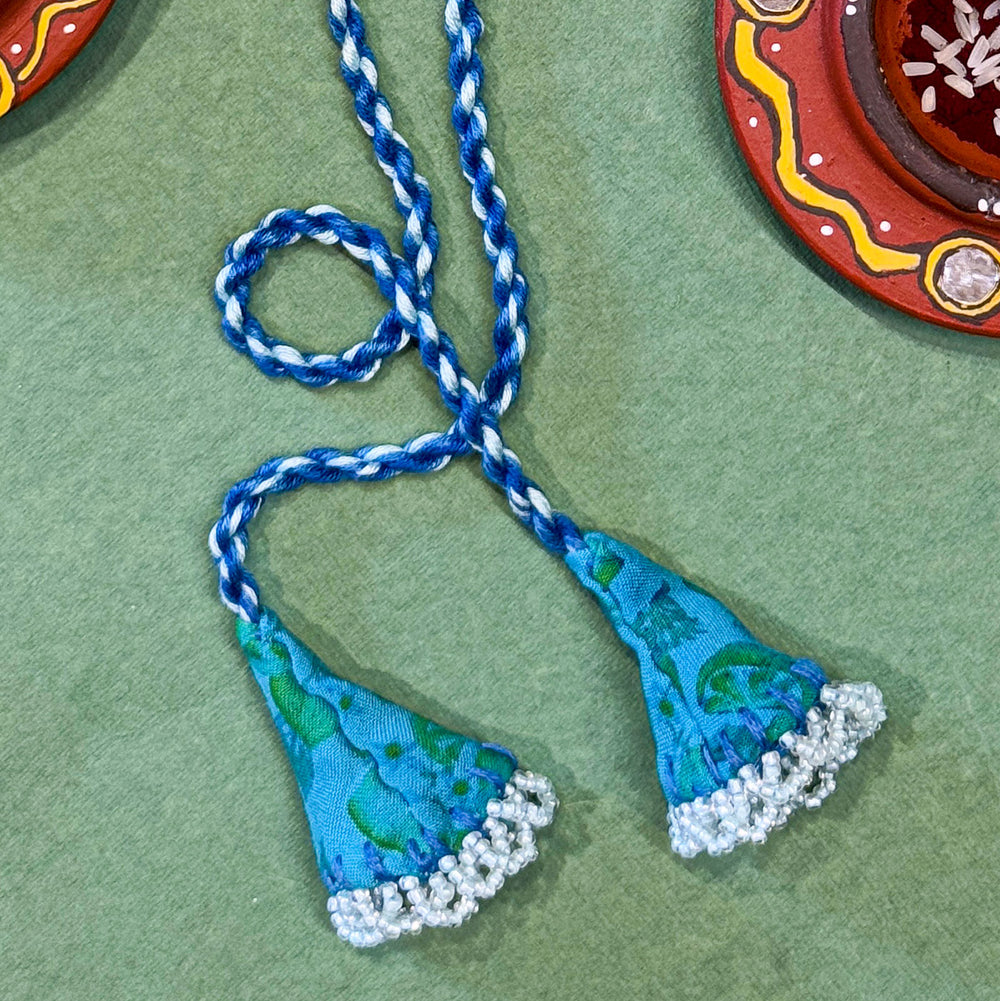 Handmade Reusable Blue Mirror And Jhumki Rakhi For Bhaiya And Bhabhi - End Detail Close-up