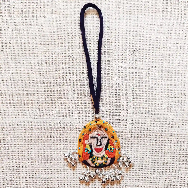 Handmade Dori Work And Ghungroo Raja Rani Bhaiya Bhabhi Rakhi With Roli Chawal Set Of 2 - Front View of Face Pendant Only
