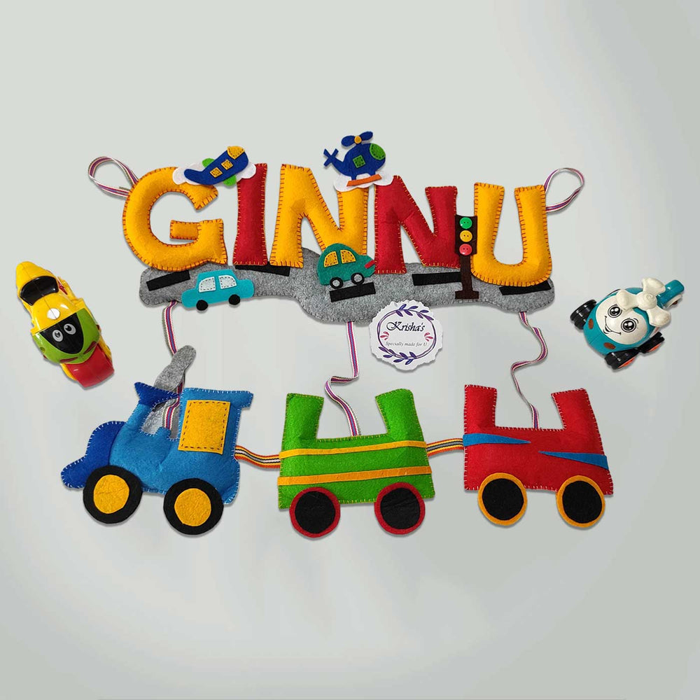 Personalized Handmade Train Theme Felt Name Plate - Front View with Hanging Strings