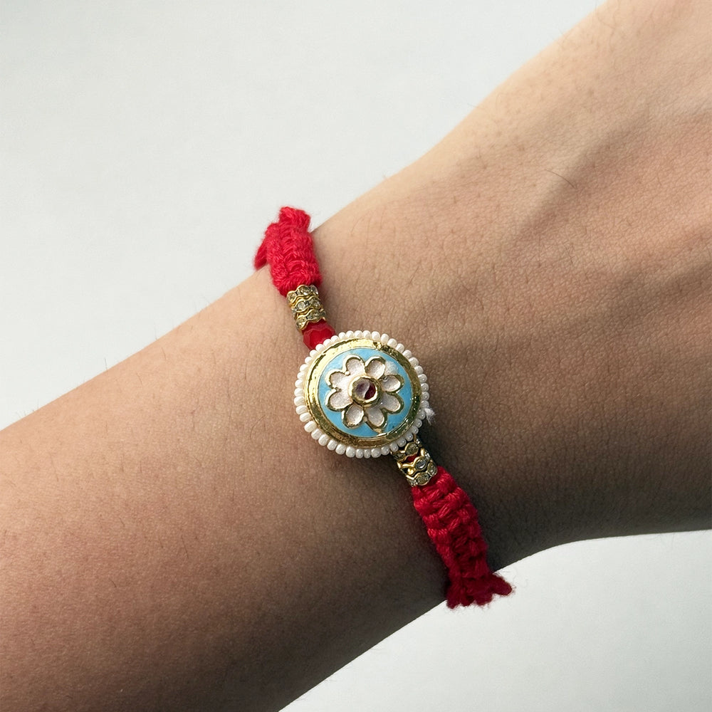 Handmade Elegant Flower Rakhi With Roli Chawal - Worn on Wrist Close-up