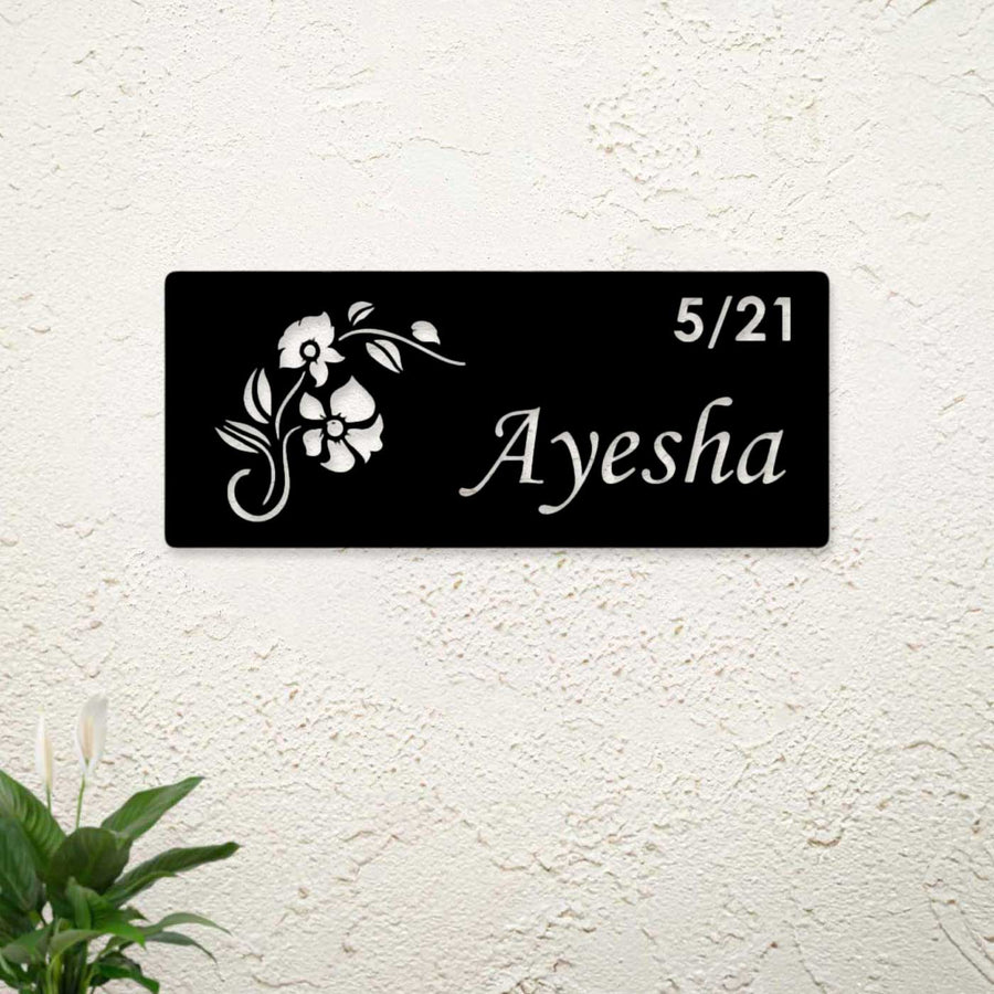 Personalized Laser Cut Floral Theme Steel Name Plate 2 - Mounted on Wall Showing Personalization