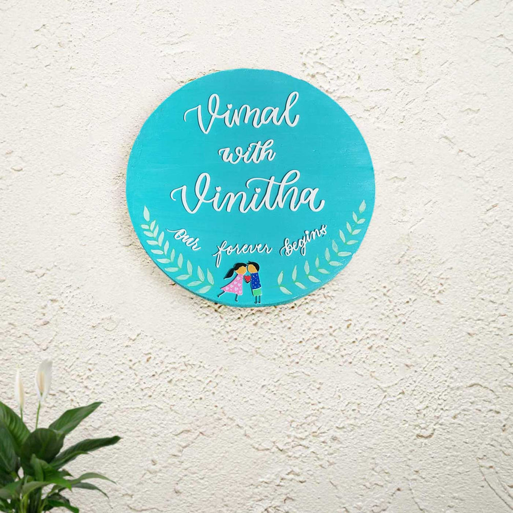 Personalized Blue Round Pine Wood Name Plate - Mounted on Textured Wall