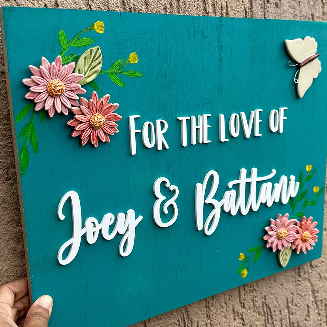 Personalized Handmade Floral Wooden Name Plate For Couples - Angled Close-up with Hand Holding