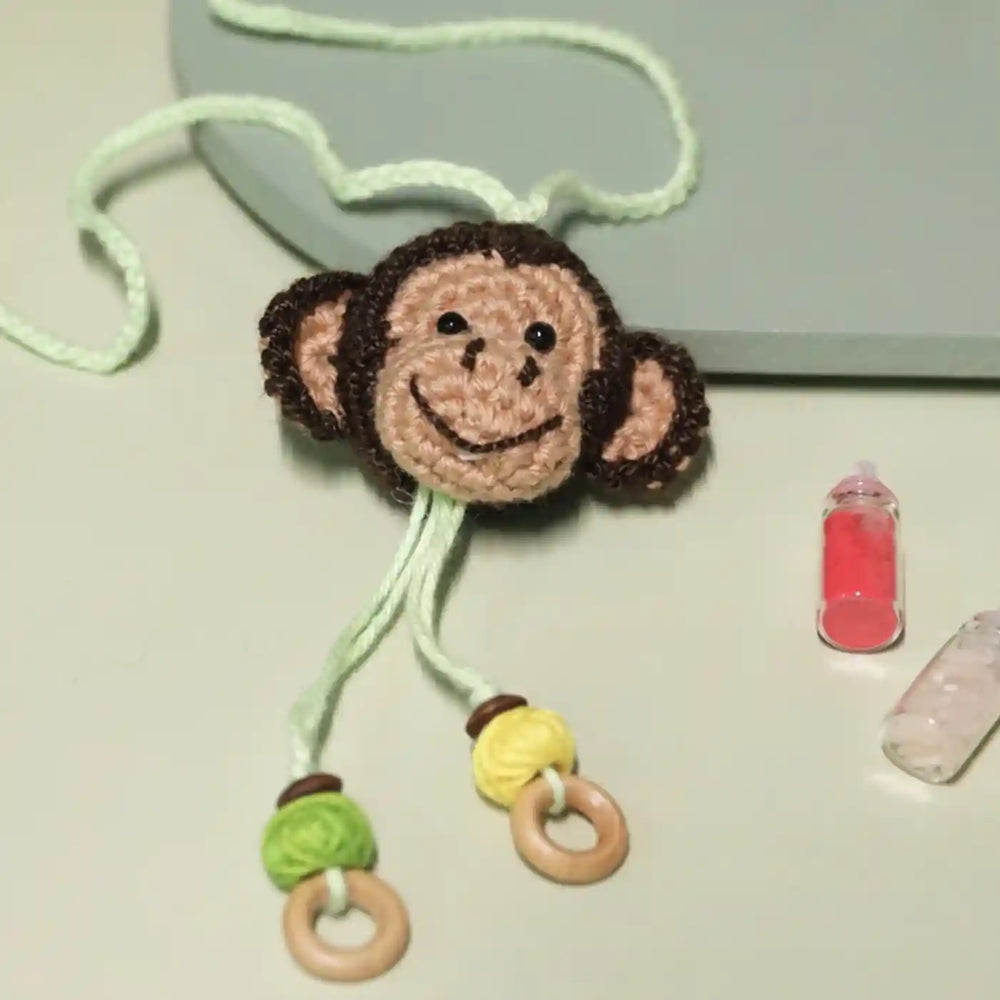 Handmade Crochet Playful Monkey Kids Lumba Rakhi For Girls With Roli Chawal - Close-up Detail View