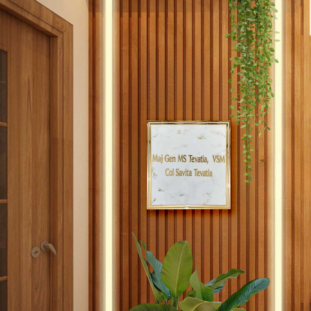 Personalized White And Gold Marble Textured Resin Name Plate - Mounted on Wood Slat Wall