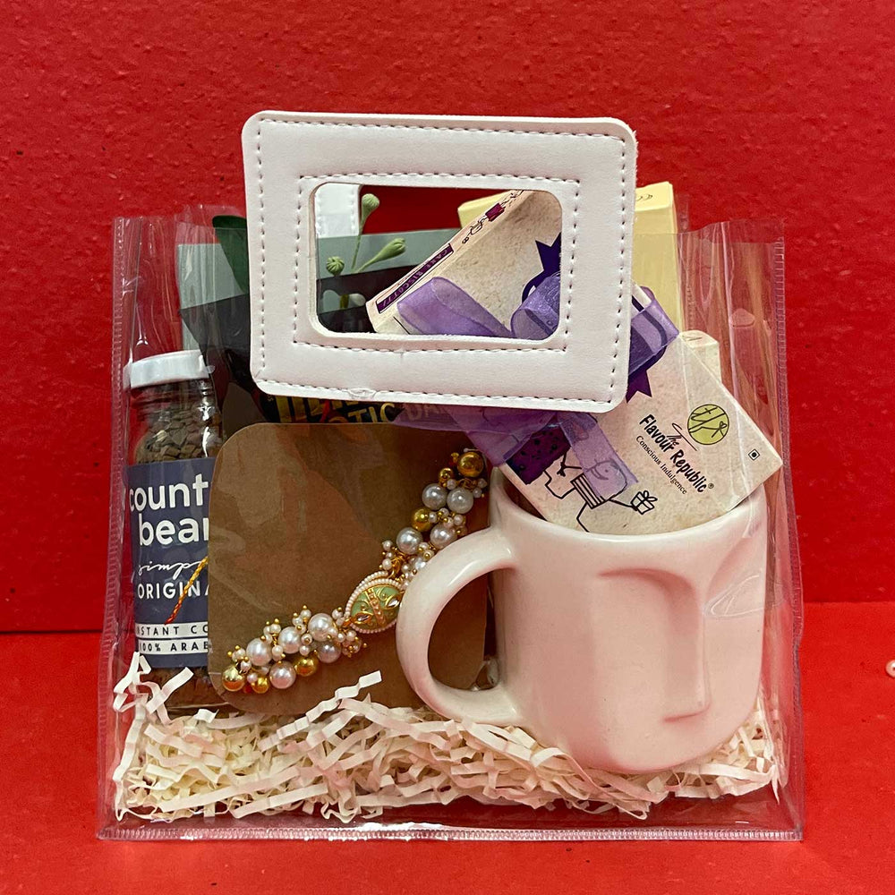 Photo Personalized Handmade Crumbs And Chaos Rakhi Hamper Includes 1 Mug 2 Biscotti 5 Photos 2 Brownies 1 Marble Lotus 1 Chocolate 1 Coffee And 1 Set Bhaiya Bhabhi Rakhi - Packed in Clear Gift Bag
