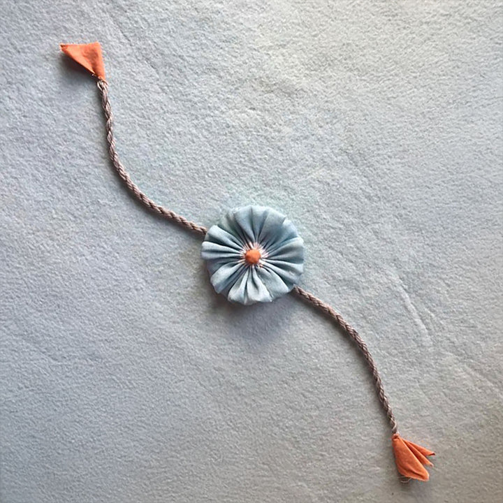 Handmade Flower Bloom Design Upcycled Fabric Rakhi With Roli Chawal For Brother - Single Hairband Detail Close-up