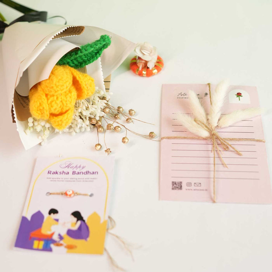 Personalized Handmade Crochet Tulip Dried Bunch Rakhi Hamper Includes 1 Crochet Flower Bunch 1 Message Card And 1 Rakhi And Roli Chawal - Flat Lay with Accessories