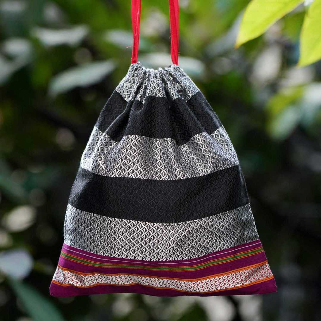 Handmade Black & Silver Khunn Fabric Cotton Thamboolam Potli with Fuchsia Border
