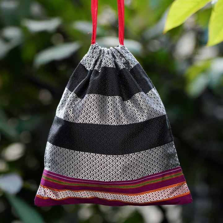 Handmade Black & Silver Khunn Fabric Cotton Thamboolam Potli with Fuchsia Border